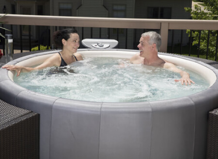Couple in soft tub hot tub in Metairie, LA