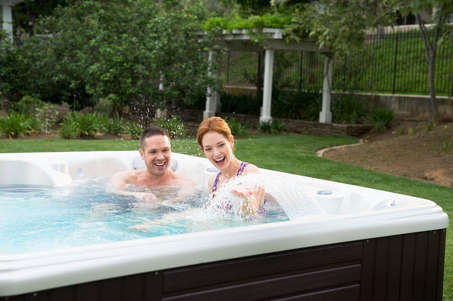 New Orleans couple soaking in a hot tub